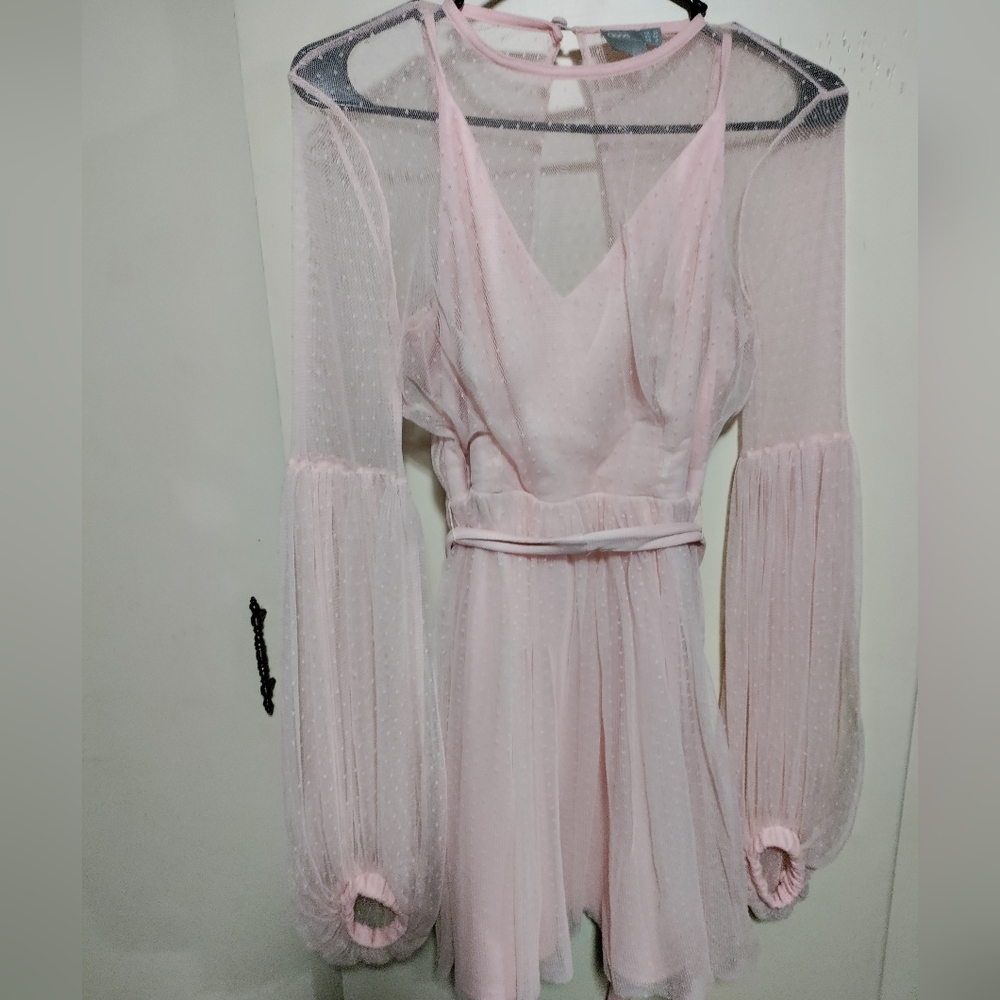 Light pink and polka-dotted dress
